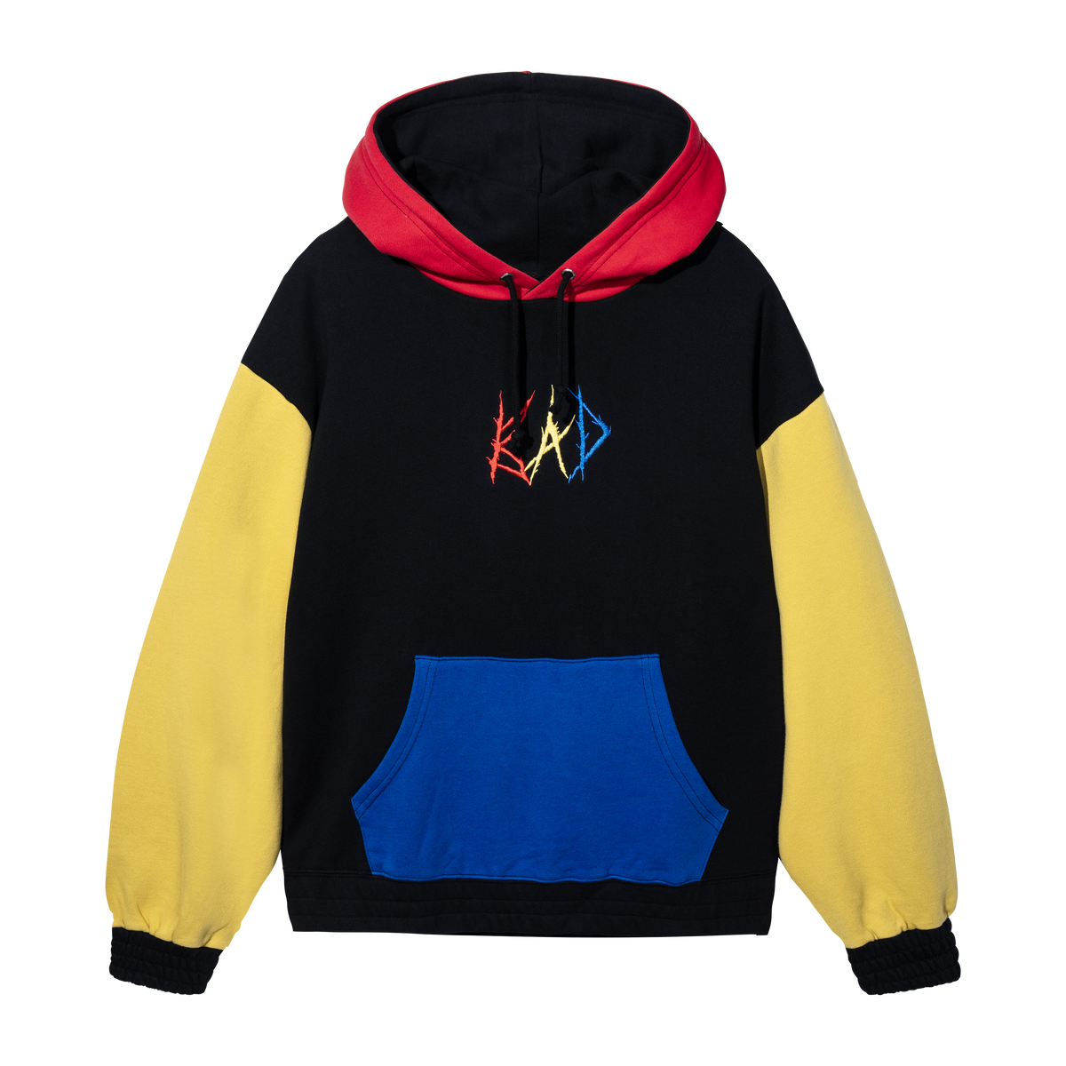 A colorblock hoodie with black, rainbow multicolor, and yellow sleeves, and a blue front pocket. The hoodie has a embroidered logo on the chest.